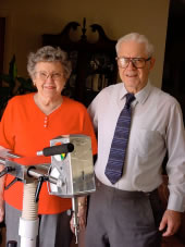 Cecil Laney seen here with Mrs Laney and instrument